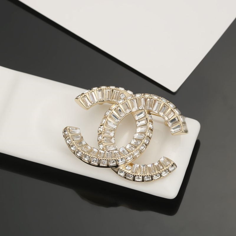 Ch**el brooches